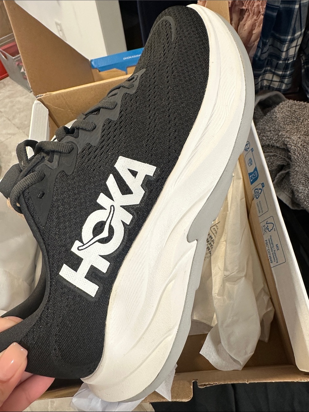 Hoka Men's Black and White Running Shoe with Prominent Logo